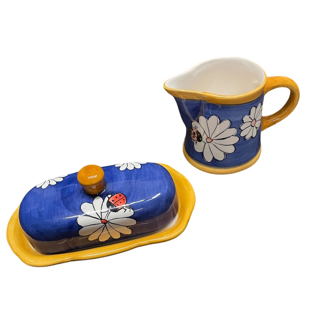 Matching butter tray and creamer mug